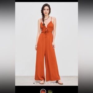 orange pantsuit/romper